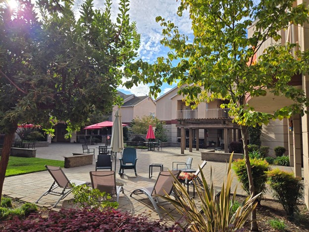 Seniors walking together in an independent living community for health and wellness